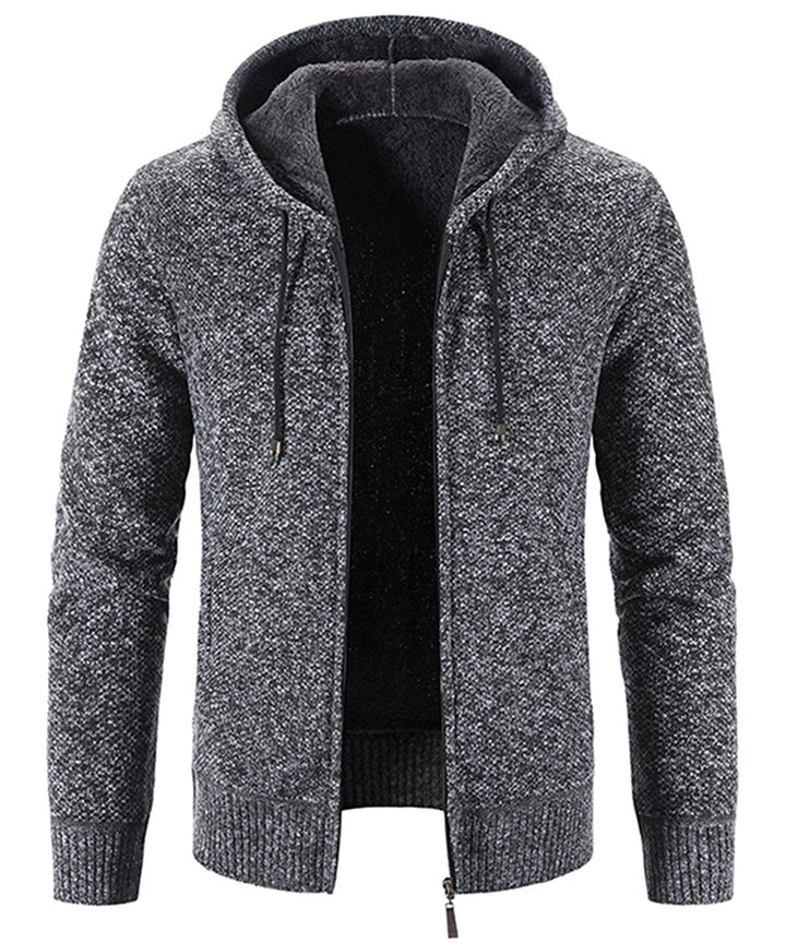 Detail of the zipper and ribbed cuff on a cozy fleece hoodie, highlighting quality
