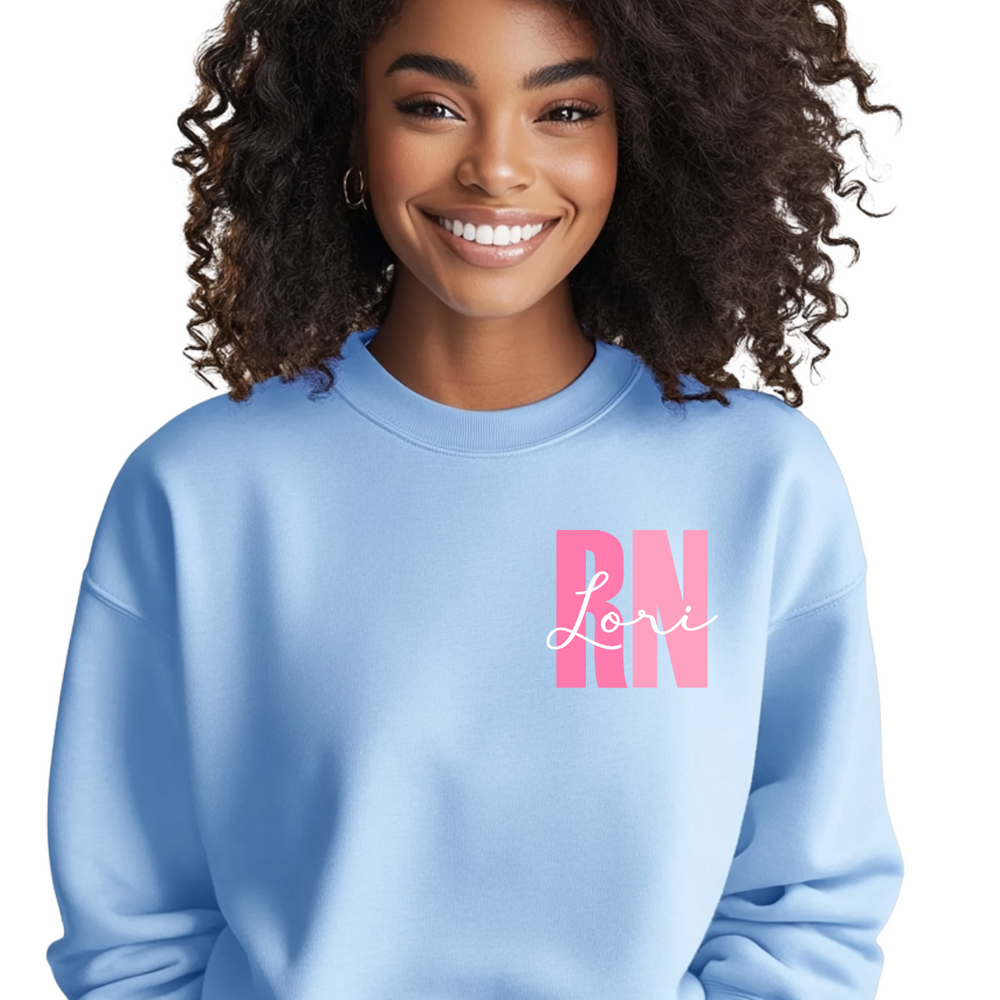 Person's hands adjusting the personalized design on a customizable unisex crewneck sweatshirt