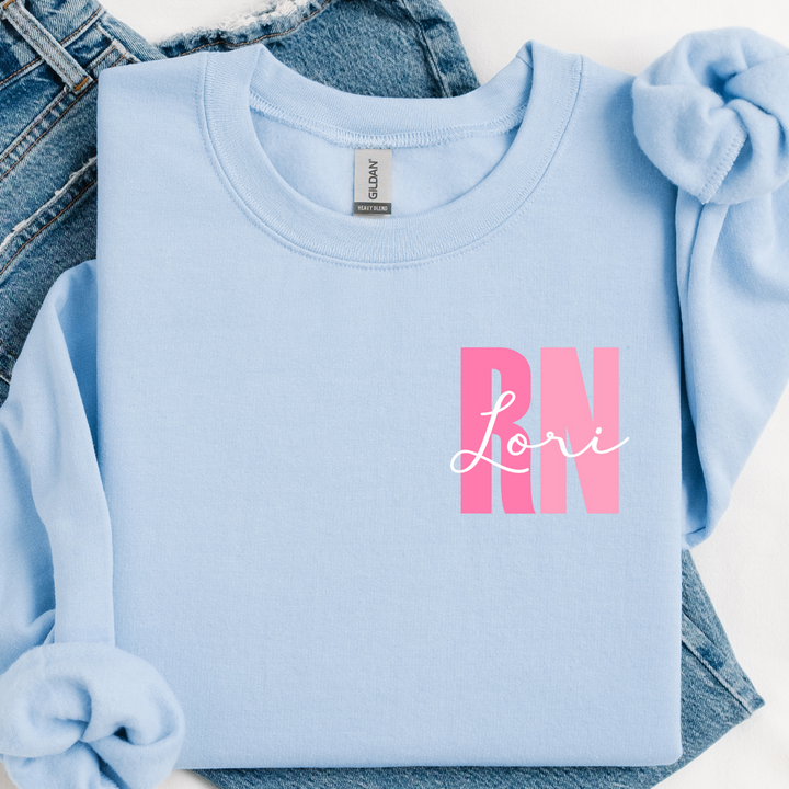 Unisex personalized crewneck sweatshirt draped over a chair, inviting and cozy, cream color