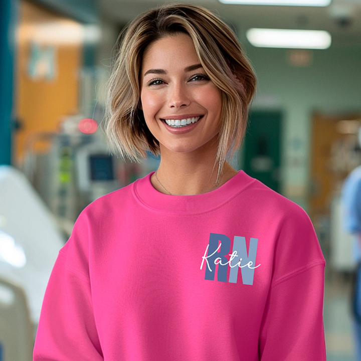 Detail of custom embroidery on a personalized unisex crewneck sweatshirt, close up text