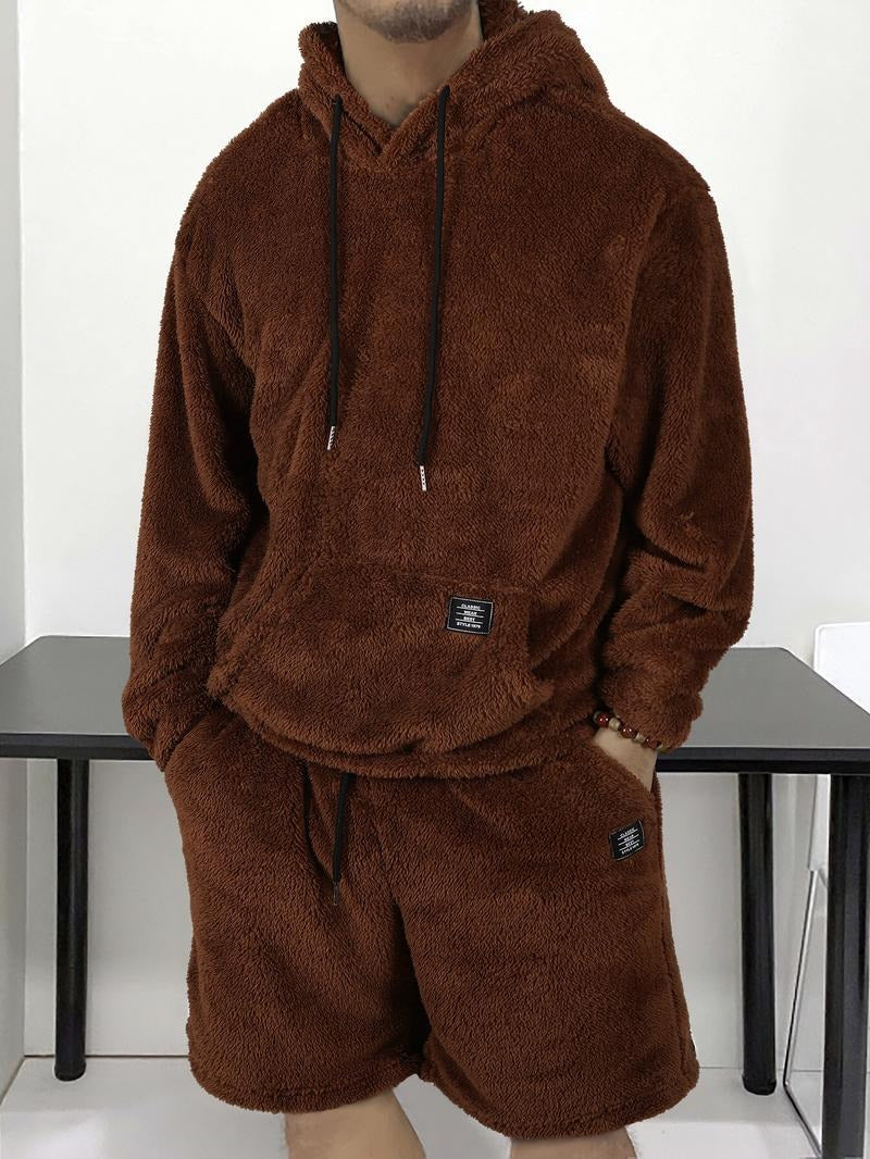 Warm unisex teddy hoodie featuring fun bear ears; great for cozy, casual style