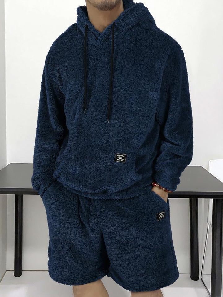 Comfortable oversized sherpa fleece hoodie with bear ears, a soft, cozy wear essential