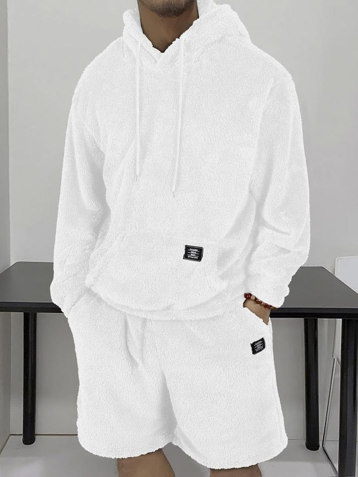 Unisex bear ear teddy hoodie in plush sherpa fleece, offering ultimate warmth and comfort