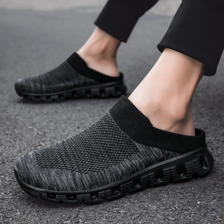 Close-up of knit upper on unisex slip-on shoe, showing texture and breathable design
