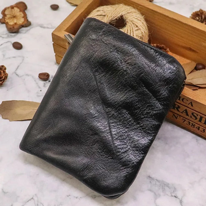 Leather wallet with unique distressed finish and reliable snap button closure