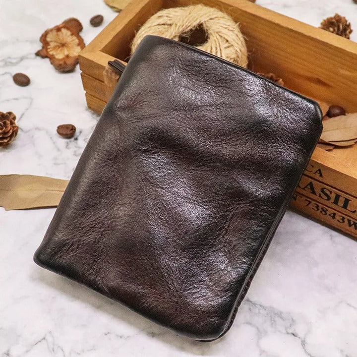 Rugged bifold wallet, distressed brown leather with secure snap closure