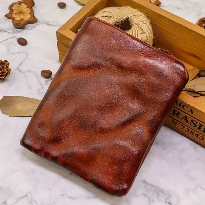Versatile distressed leather wallet with snap, ideal for both genders