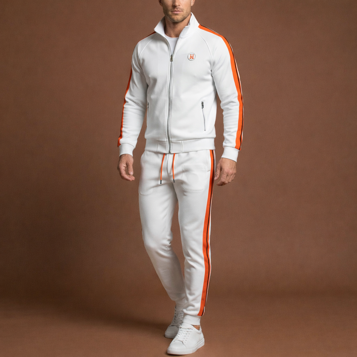 Close-up of embroidered logo on a unisex two-piece tracksuit, ideal for streetwear