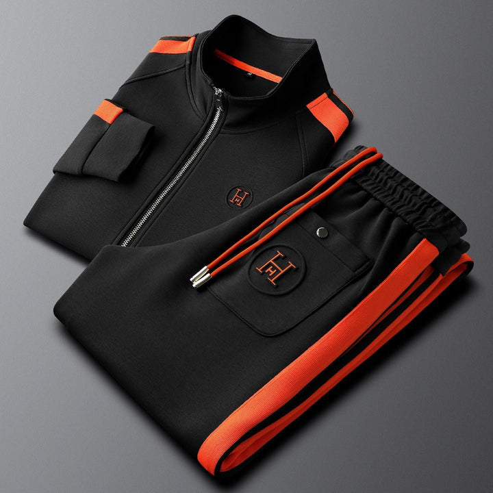 Matching two-piece tracksuit in navy, a versatile embroidered set for active or casual wear