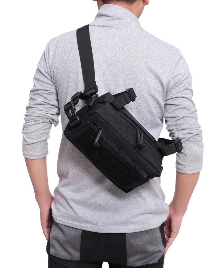 Person reaching into the Everyday Carry Sling Bag, demonstrating ease of access to contents