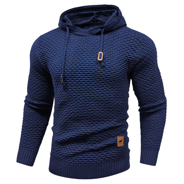 Close-up of the hoodie drawstring and hood detail on a comfort fleece pullover