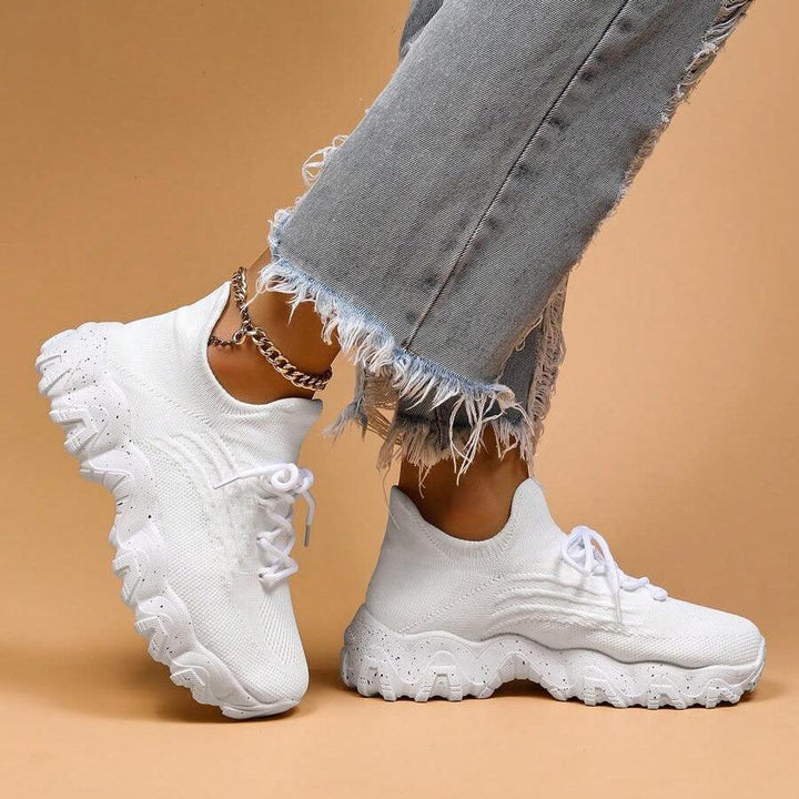 Detail of the lace-up closure on Unisex Everyday Comfort Low-Top Sneakers, ensuring a snug and adjustable fit
