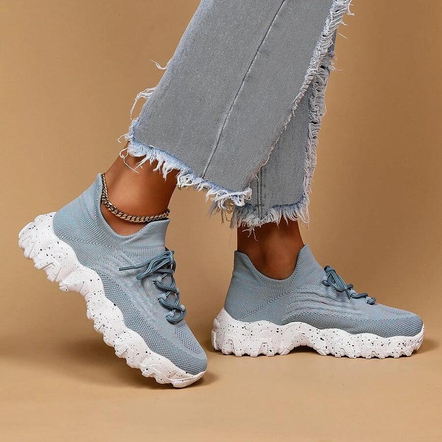 Front view of Unisex Everyday Comfort Low-Top Sneakers, showcasing the toe box and overall shape for comfort