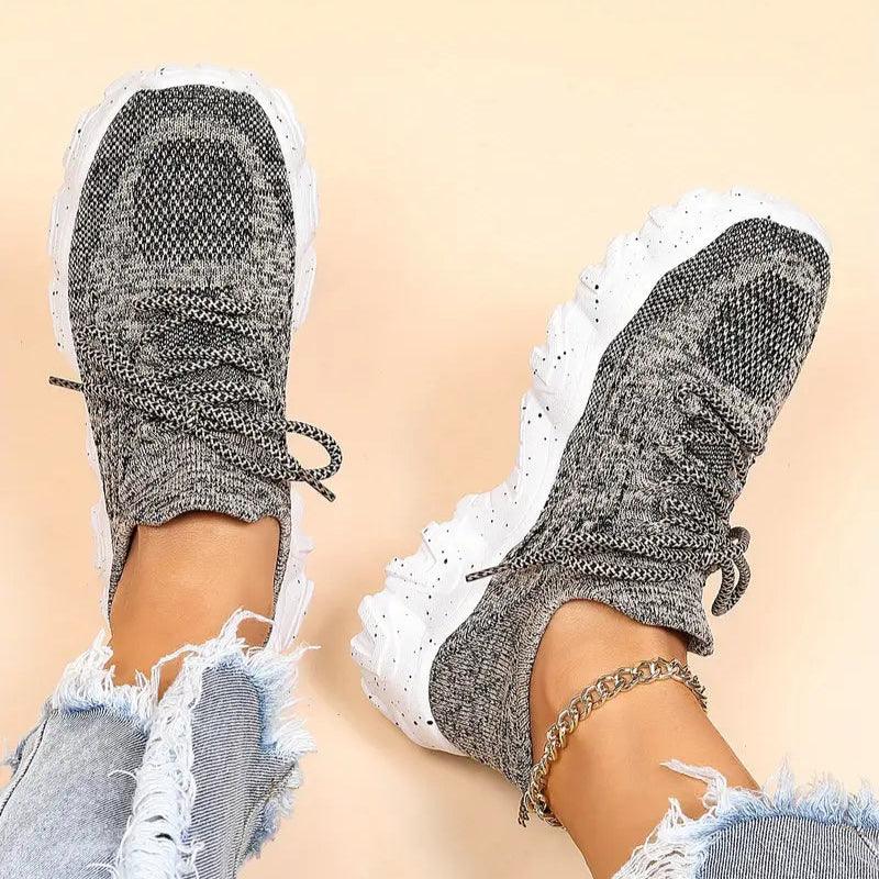 Unisex Everyday Comfort Low-Top Sneakers in a studio shot, emphasizing product detail and comfort features