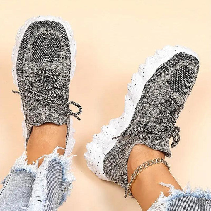 Unisex Everyday Comfort Low-Top Sneakers in a studio shot, emphasizing product detail and comfort features