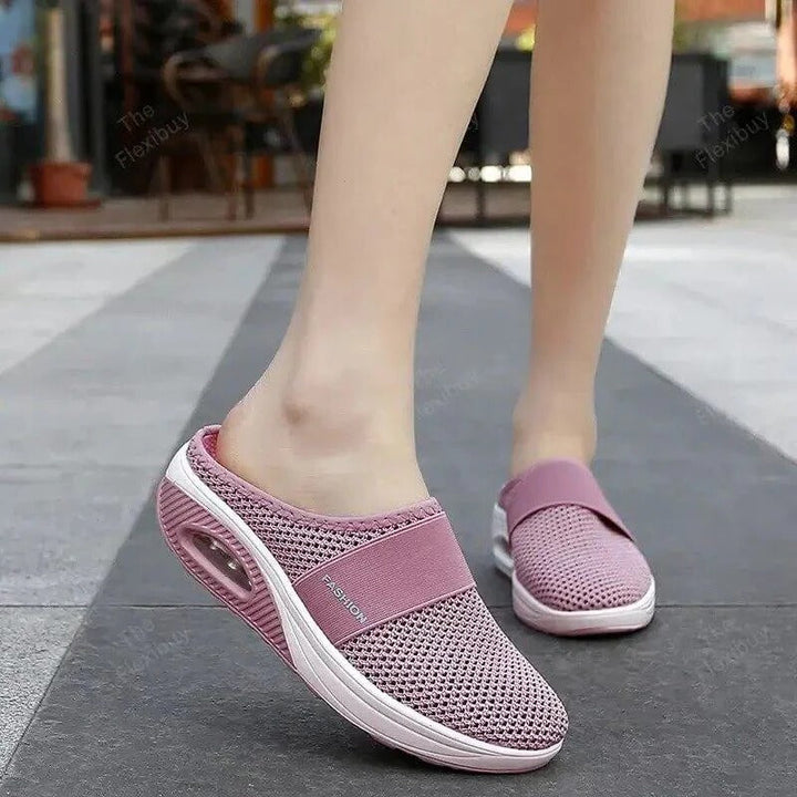 Everyday comfort slippers for men & women. Features all-day orthopedic support & breathable slip-on design.