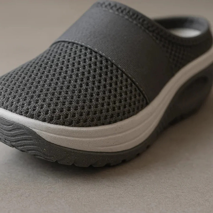 Unisex comfort slippers with all-day orthopedic support. Lightweight, breathable, and easy slip-on indoor/outdoor.
