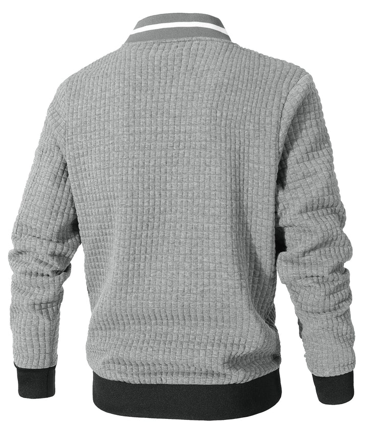 Unisex Jacket from a slightly elevated angle, capturing its urban aesthetic and lightweight construction.