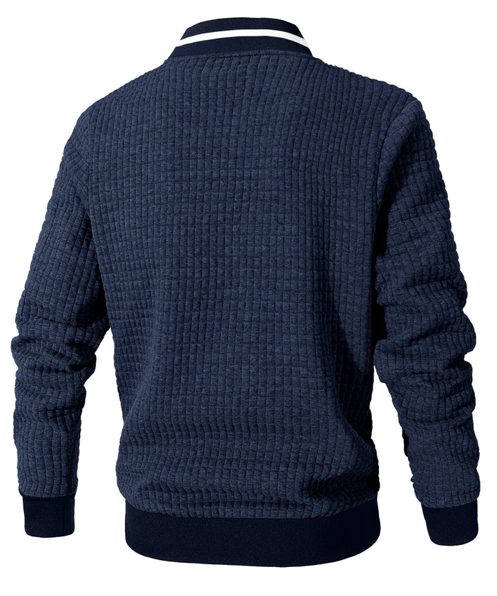 Close-up of the Unisex Jacket's hem and cuffs, ensuring a snug fit for extra warmth.