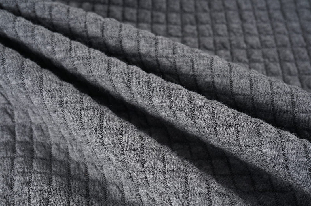 Unisex Lightweight Warmth Jacket on a mannequin, highlighting its structured yet comfortable form.