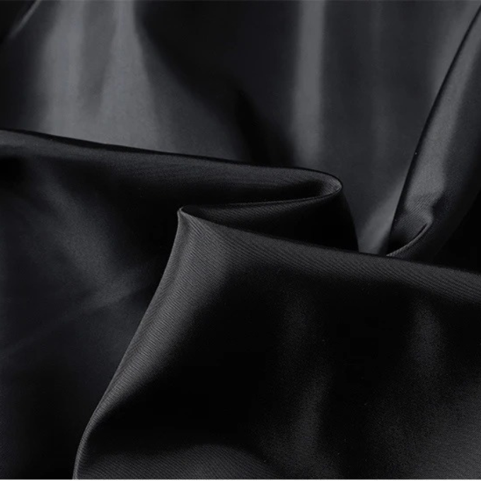 Warm everyday puffer jacket, unisex style, close-up of quilted texture and zipper detail