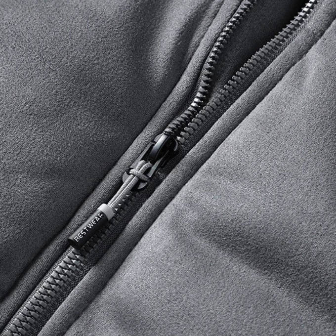 Close-up of the durable fabric on a unisex everyday puffer jacket, ideal for winter outfitting