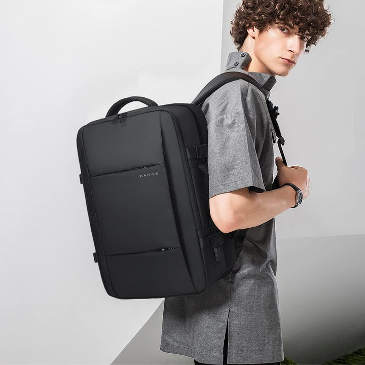 Waterproof unisex travel bag, 26-45L capacity with dedicated laptop compartment.