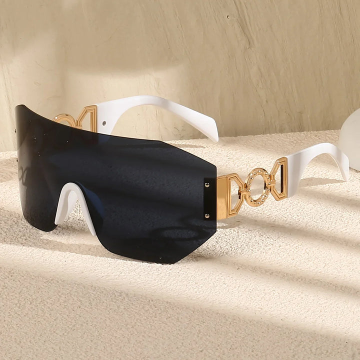 Side view of model wearing unisex futuristic frameless sunglasses, highlighting the unique eyewear style