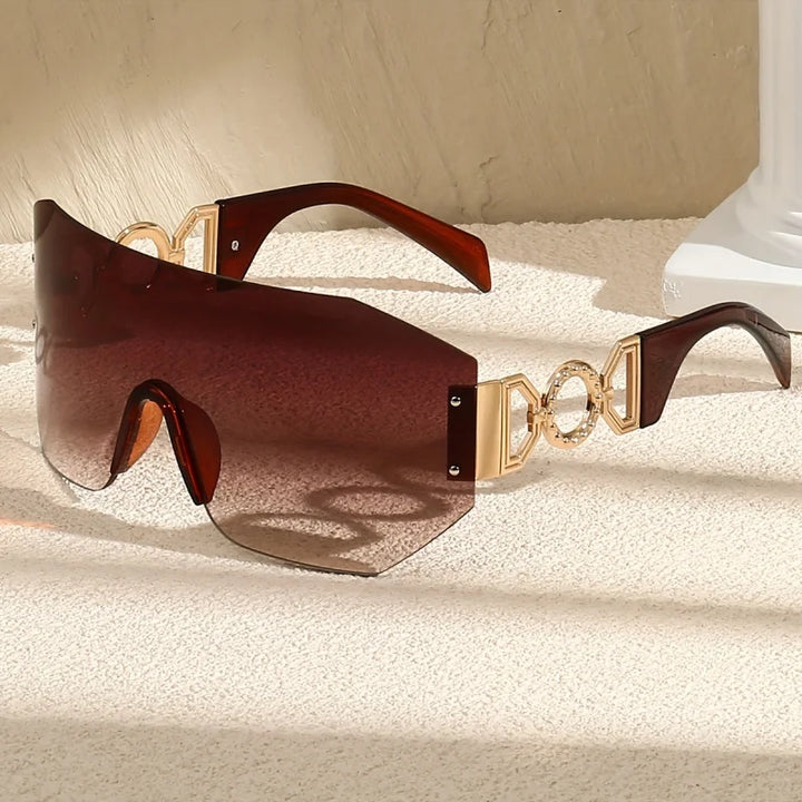 Luminous frameless sunglasses with a subtle gradient lens, perfect for a futuristic and stylish look
