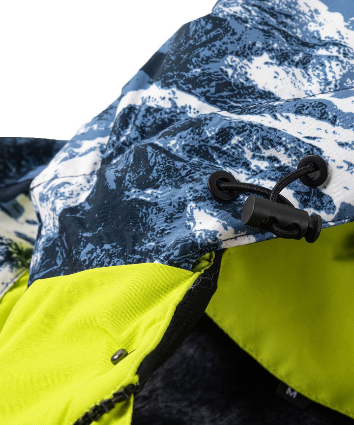 Action shot of person wearing the Unisex Glacier Print Insulated Jacket, hiking in a snowy mountain range.