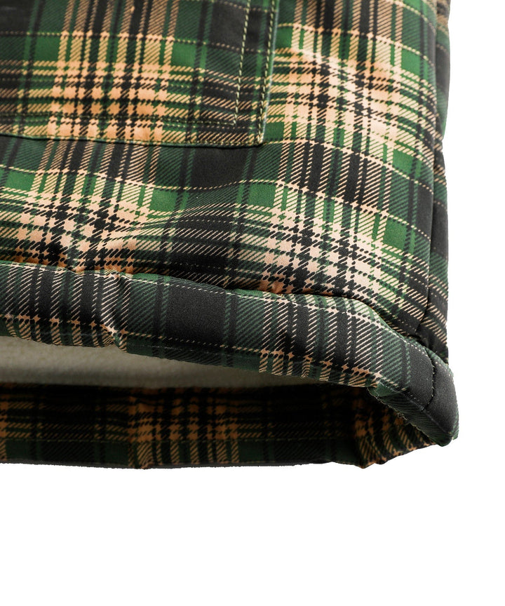Green insulated vest for unisex wear, highlighting its durable outerwear design
