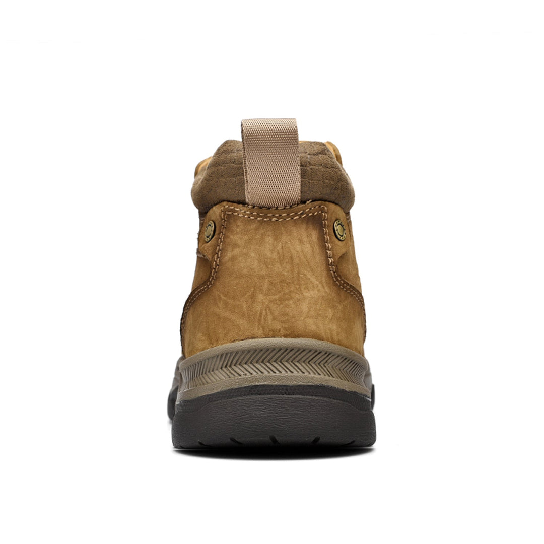 Close-up of black leather texture on unisex high-top orthopedic shoes for daily comfort