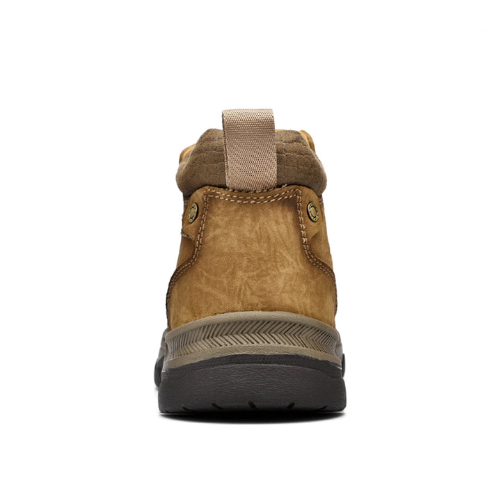 Close-up of black leather texture on unisex high-top orthopedic shoes for daily comfort