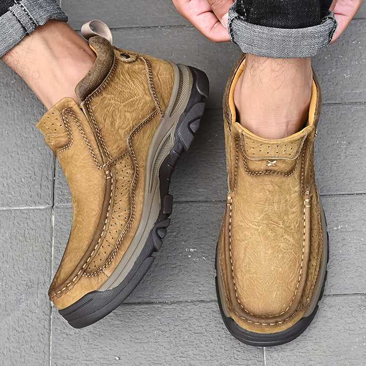 Detail of the lacing system on unisex black leather high-top orthopedic comfort shoes