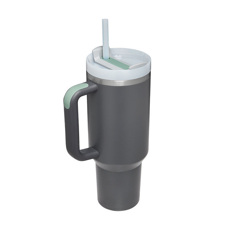 Large insulated straw mug with handle for active lifestyles. Keeps beverages hot/cold.