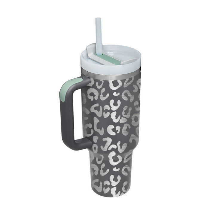 Insulated travel mug with handle & straw for hot/cold drinks. Durable & reusable for daily use.