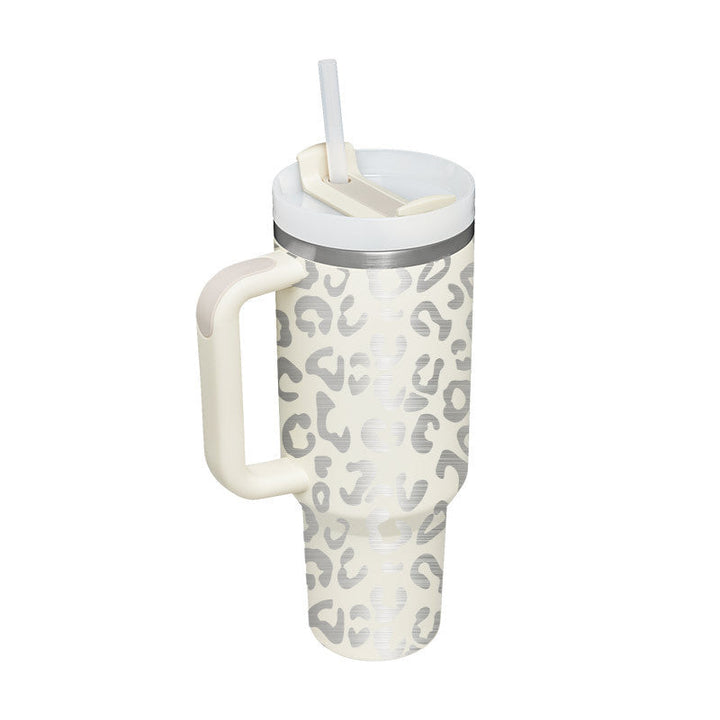 Unisex insulated mug with handle & straw. Durable drinkware for hot coffee or cold water.
