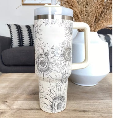 Durable insulated travel mug with handle & straw. Reusable for hot coffee or cold water.