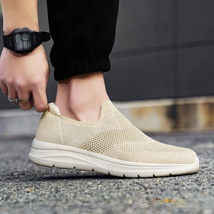 Top-down view of unisex knit slip-on shoes, emphasizing their easy wear and modern style.