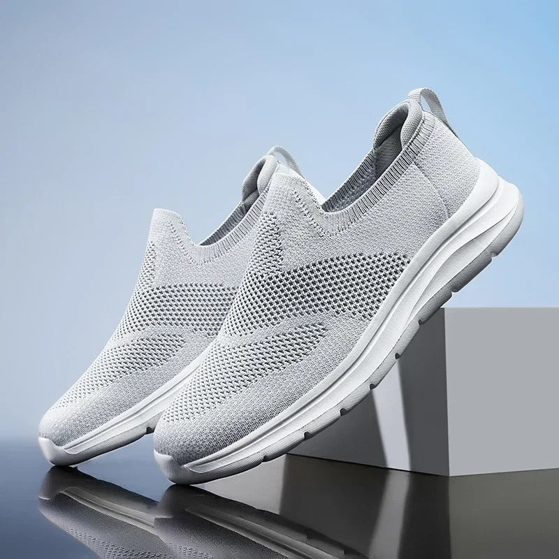 Comfortable unisex knit sneakers with a durable foam sole, ideal for long walks and casual outings.