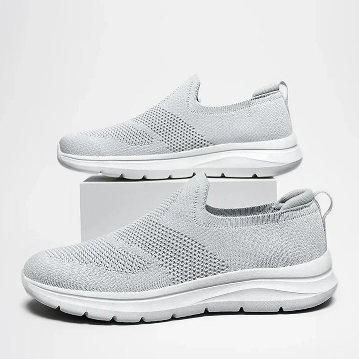 Stylish unisex knit slip-on footwear in a versatile color, perfect for any casual wardrobe.