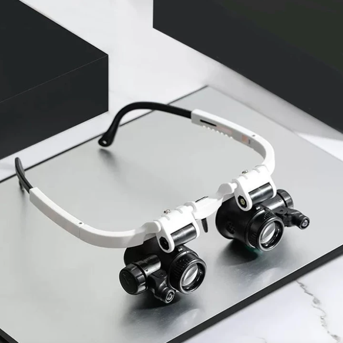 LED magnifier headband for jewelry repair & electronics; adjustable with 8x, 15x, 23x optical zoom.