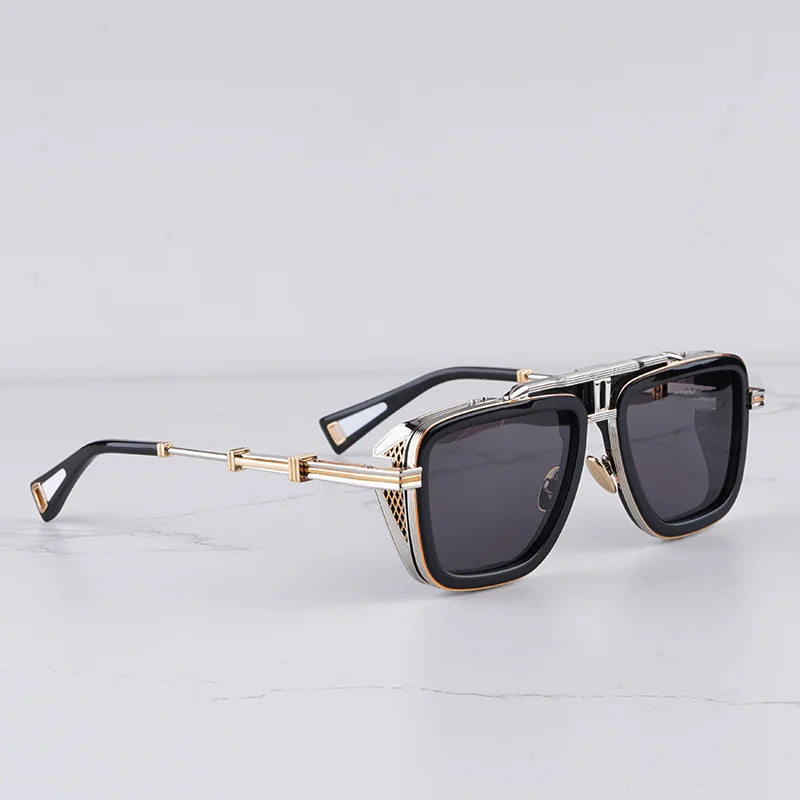 Fashionable unisex sunglasses featuring a unique architectural frame and stylish gradient lenses.