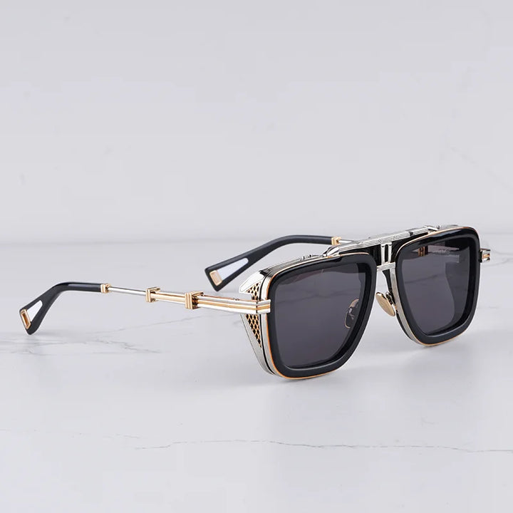Fashionable unisex sunglasses featuring a unique architectural frame and stylish gradient lenses.