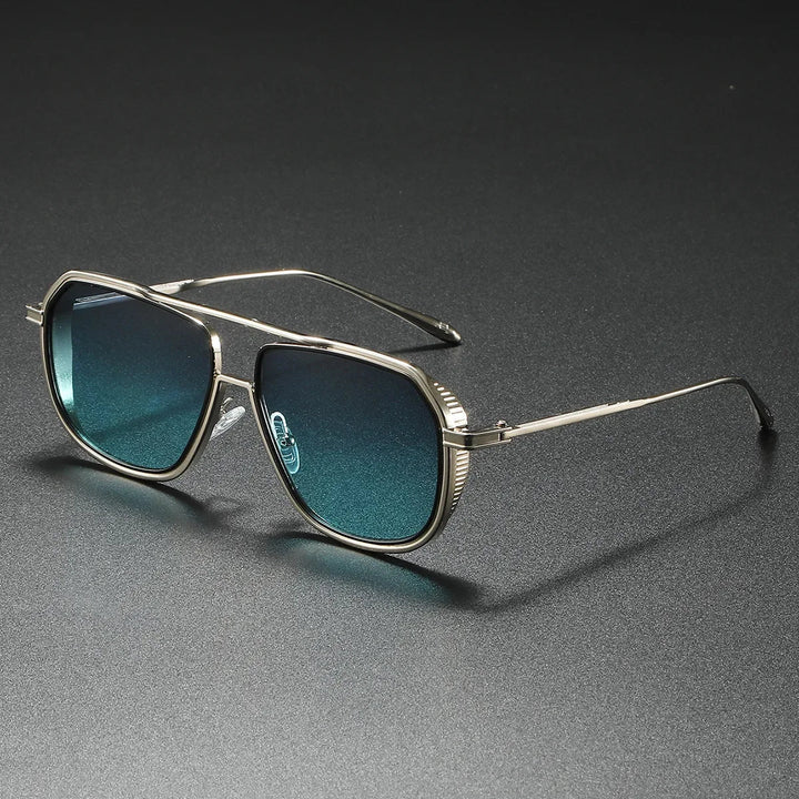 Close-up of unisex luxury aviator sunglasses, showing gradient lens & elegant metal frame detail.