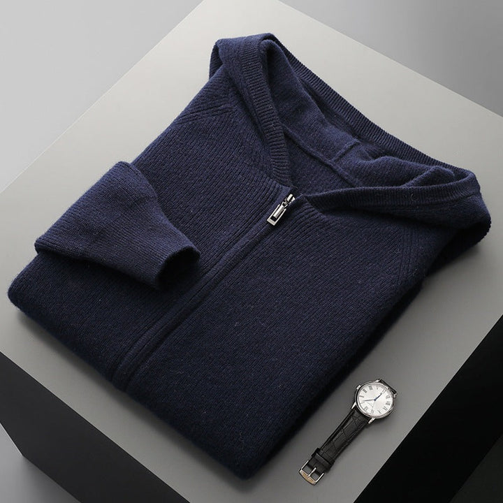 Flat lay of a Unisex Merino Wool Full-Zip Hoodie, emphasizing its soft texture and versatile knitwear.