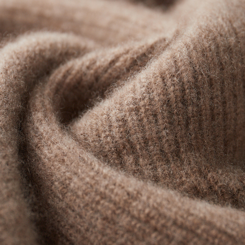 Unisex Merino Wool Full-Zip Hoodie folded neatly, ready for travel or everyday casual wear.