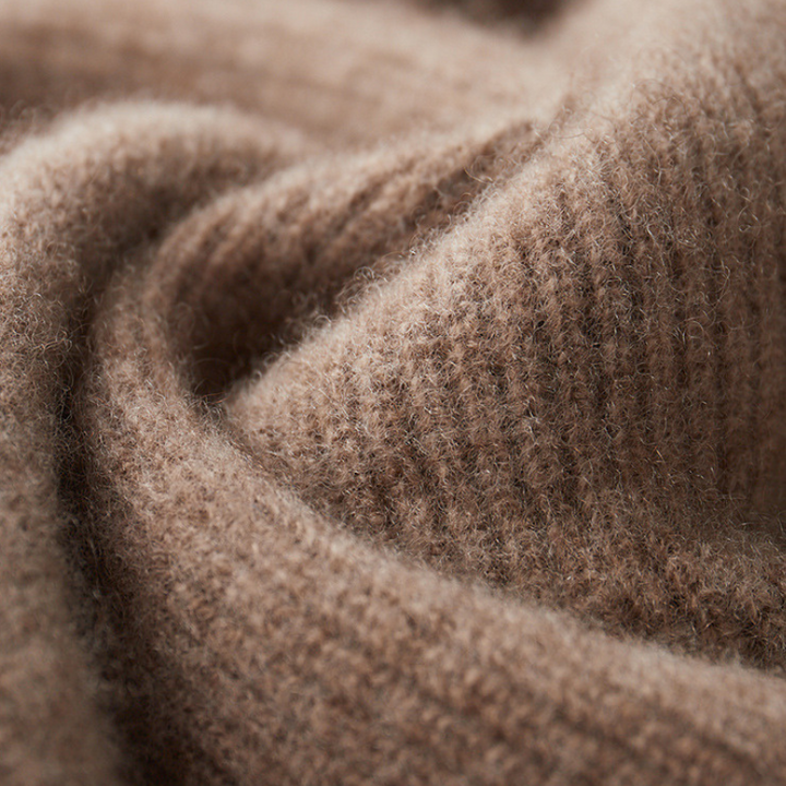 Unisex Merino Wool Full-Zip Hoodie folded neatly, ready for travel or everyday casual wear.