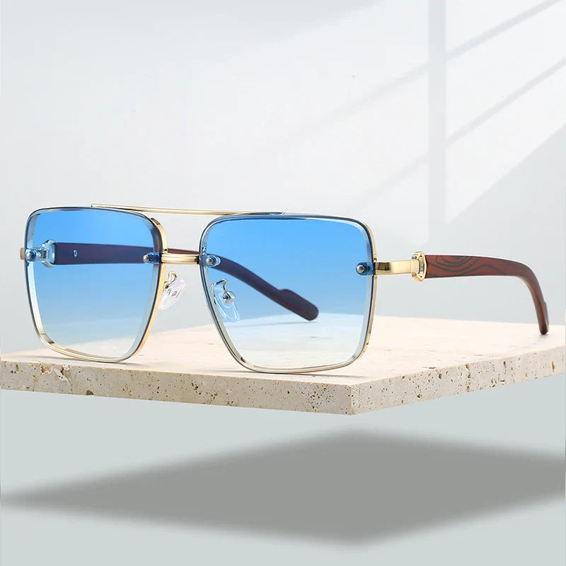 Unisex modern aviator sunglasses with gold frame and gradient lenses, offering UV400 protection.
