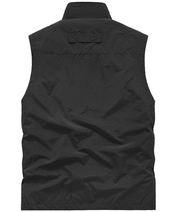 Back view of a durable nylon/polyester vest, an essential piece of travel and hiking gear.